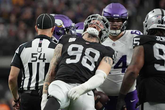 Dec 10, 2023; Paradise, Nevada, USA; Las Vegas Raiders defensive end Maxx Crosby (98) celebrates after a tackle against the Minnesota Vikings in the first half at Allegiant Stadium. Mandatory Credit: Kirby Lee-USA TODAY Sports